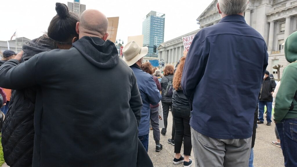 Video of demonstrators pledging allegiance to the US of A.